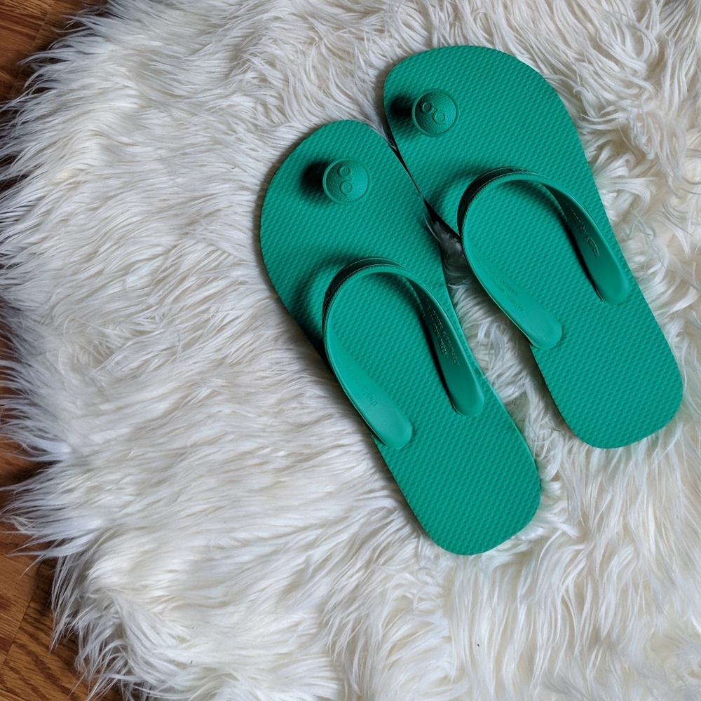 Gurus green flip flops